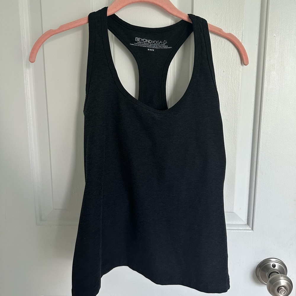 Beyond Yoga workout top. Dark gray. Never worn. Built in shelf bra.